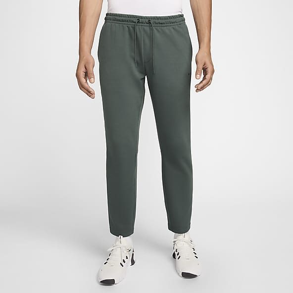 Green nike jogging pants sales